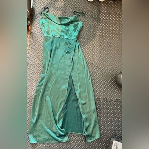 Beautiful emerald green midi dress with slit in the front